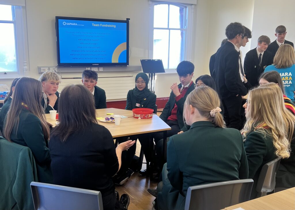 Year 13 students taking part in group discussion at a workshop